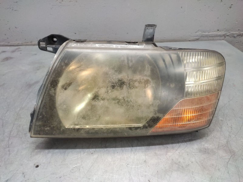 Recambio de faro izquierdo para mitsubishi pajero -- referencia OEM IAM   