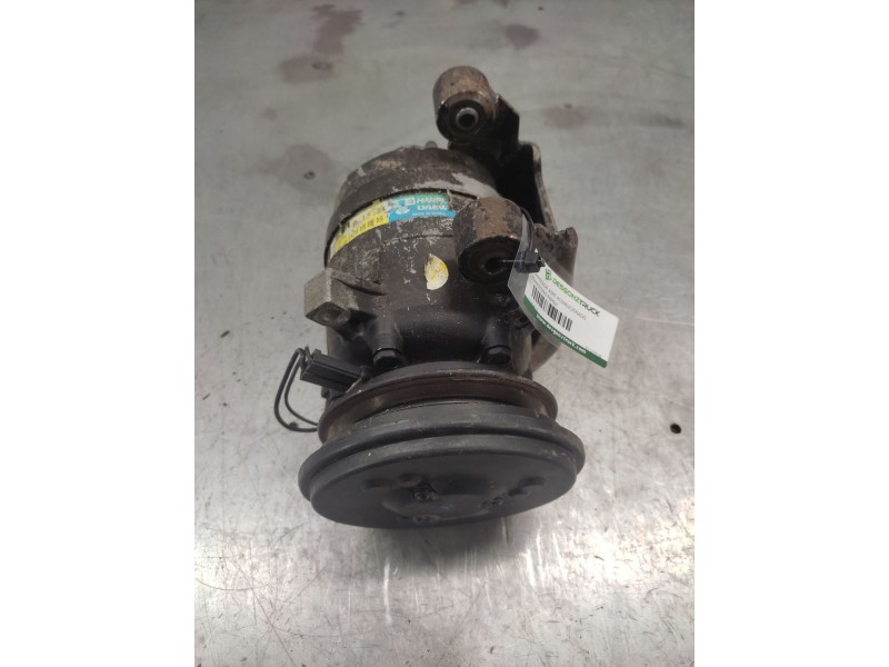 Recambio de compresor aire acondicionado para ssangyong family 2.5 d referencia OEM IAM 5110518  