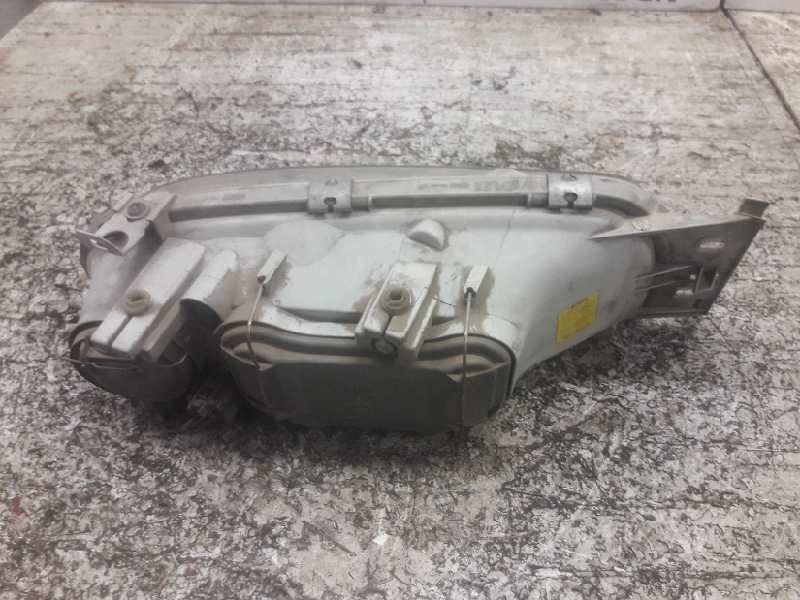 Recambio de faro izquierdo para ford fiesta berlina ghia referencia OEM IAM   