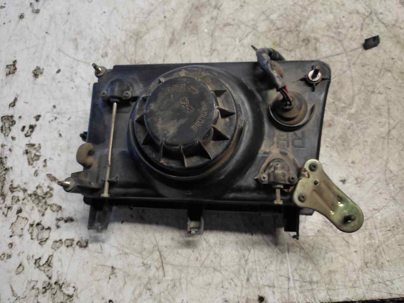 Recambio de faro derecho para ssangyong family 2.5 diesel referencia OEM IAM   