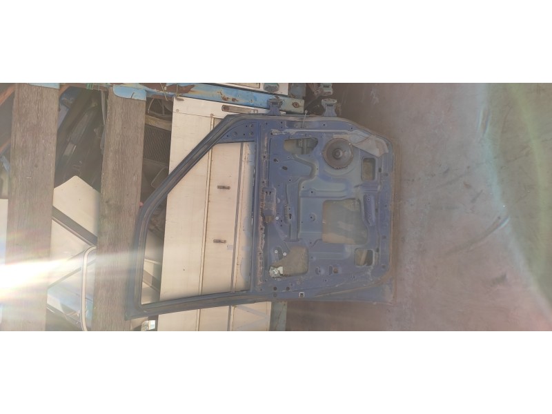 Recambio de puerta delantera izquierda para nissan vanette cargo 2.3 diesel referencia OEM IAM   