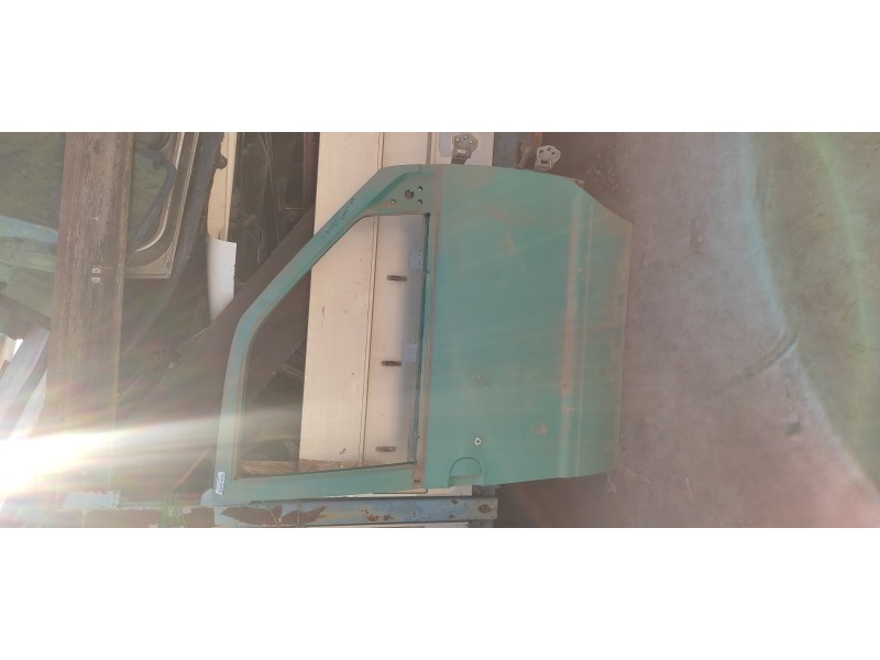 Recambio de puerta delantera derecha para nissan vanette cargo 2.3 diesel referencia OEM IAM   