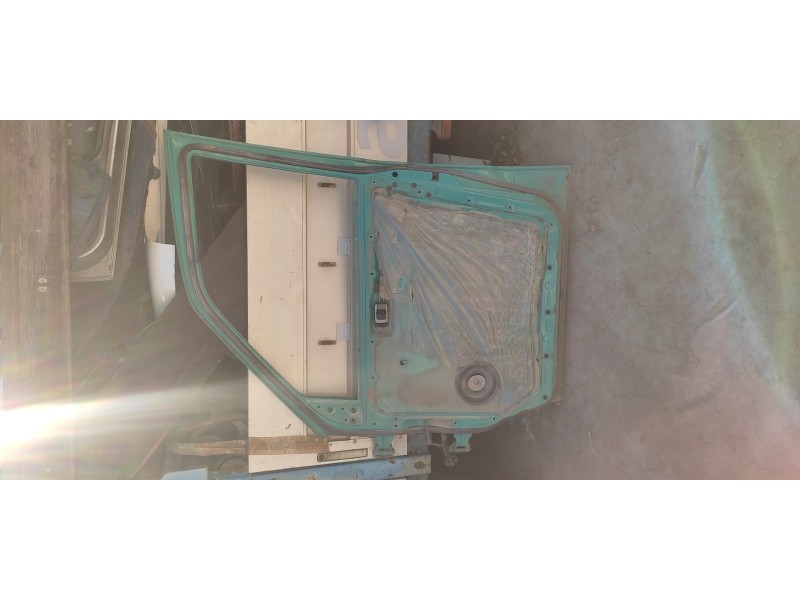 Recambio de puerta delantera derecha para nissan vanette cargo 2.3 diesel referencia OEM IAM   