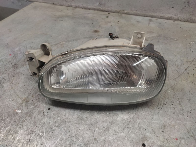 Recambio de faro izquierdo para mazda 121 (db) chic referencia OEM IAM   
