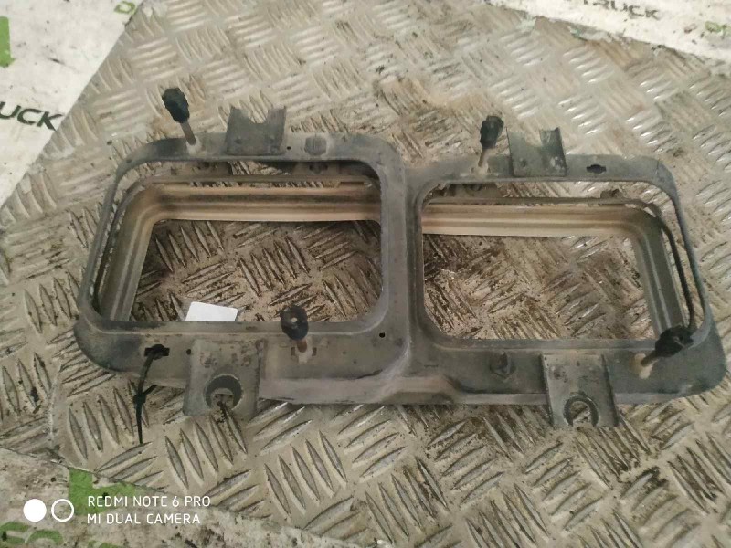 Recambio de soporte faro izquierdo para nissan trucks m m-90.150 referencia OEM IAM   