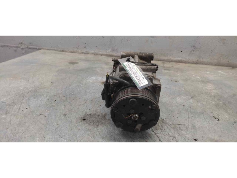 Recambio de compresor aire acondicionado para ford fiesta (cbk) ambiente referencia OEM IAM RCA1000  