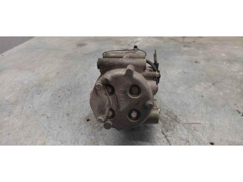 Recambio de compresor aire acondicionado para ford fiesta (cbk) ambiente referencia OEM IAM RCA1000  