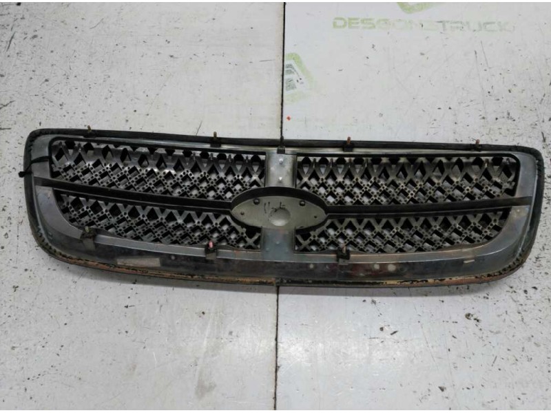 Recambio de rejilla delantera central para kia carnival ii 2.9 cdri ex referencia OEM IAM   